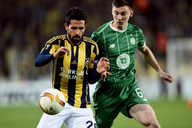 Fenerbahce's Alper Potuk vies with Kieran Tierney. Picture: AFP/Getty