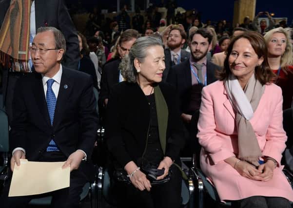 UN Secretary-General Ban Ki-moon and his wife Yoo Soon-taek with French Minister for Ecology Segolene Royal in Paris. Picture: AFP/Getty Images