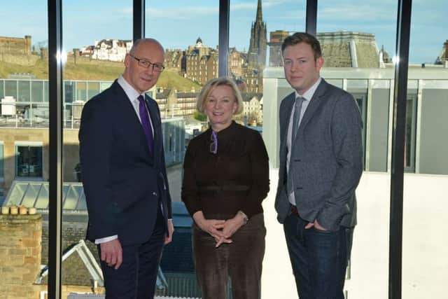 John Swinney with Moya Greene and Mallzee s chief executive Cally Russell at the firms new Edinburgh office yesterday. Picture: Jon Savage