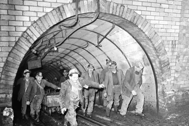 The last shift of miners emerge from Oxenford number 3 pit near Ormiston, East Lothian, before its closure on January 30, 1959