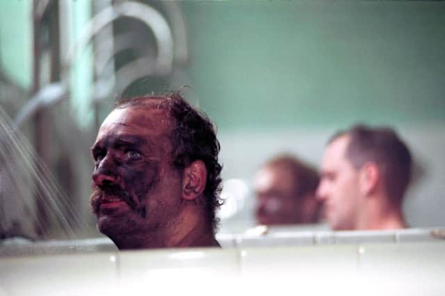 Miner David McIlwaine showers after a shift at Monktonhall colliery, East Lothian, in 1993. Picture: Ian Rutherford