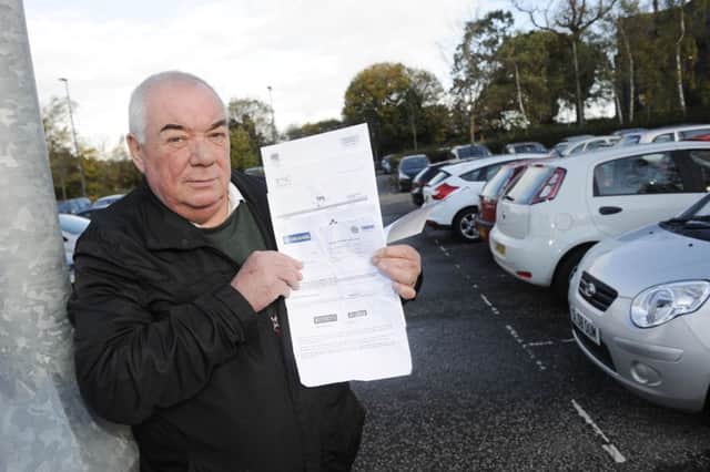 Jimmy Campbell, a staff member at Dalkeith and District Citizens Advice Bureau, is campaigning against steep fines issued by private car parks. Picture: Greg Macvean