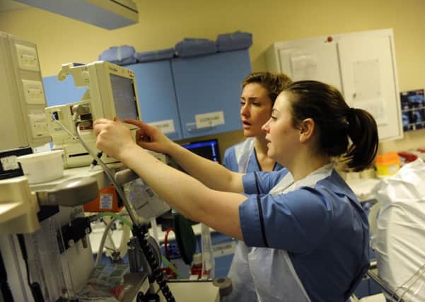 Almost half of Scottish NHS staff say they feel unable to do their jobs properly because of excessive demands on their time. Picture: Greg Macvean