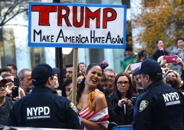 Protestors rally outside the Plaza Hotel on December 11, 2015 in New York. Picture: AFP/Getty Images