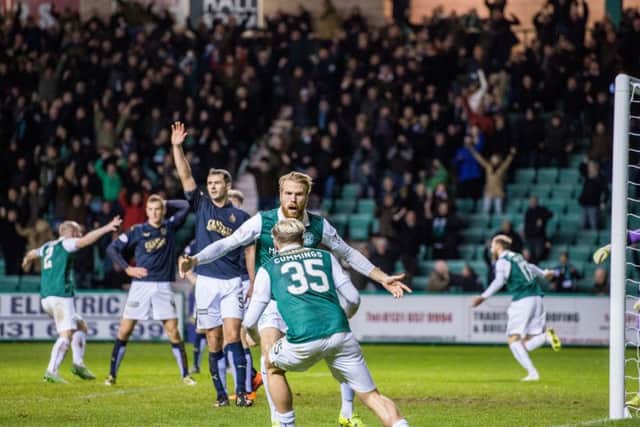 Hibernian celebrate their late equaliser. Picture: Ian Georgeson