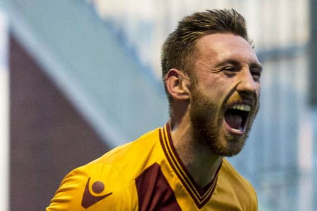 Motherwell's Louis Moult celebrates his side's second goal. Picture: SNS