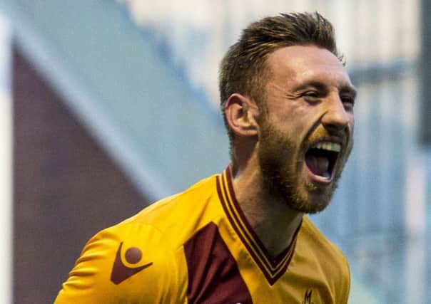 Motherwell's Louis Moult celebrates his side's second goal. Picture: SNS