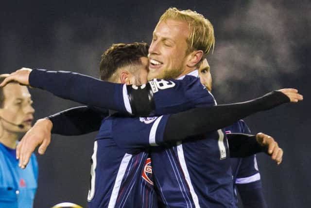 Ross County's Andrew Davies celebrates at full time. Picture: SNS