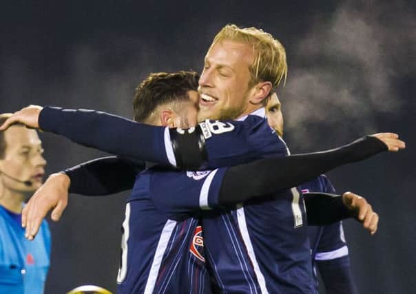 Ross County's Andrew Davies celebrates at full time. Picture: SNS