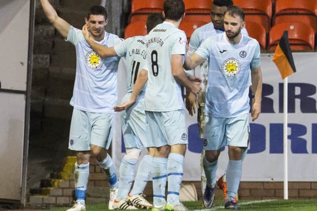Partick Thistle's Kris Doolan (left) celebrates his goal. Picture: SNS