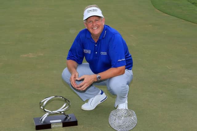 Colin Montgomerie with the MCB trophy and the John Jacobs trophy after retaining his European Senior Tour Order of Merit title. Picture: Getty