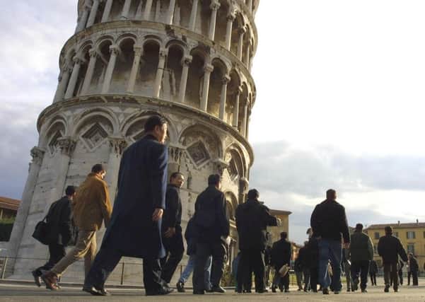 On this day in 2001, the Leaning Tower of Pisa reopened after 11 years and £20 million being spent to fortify it. Picture: AFP/Getty Images