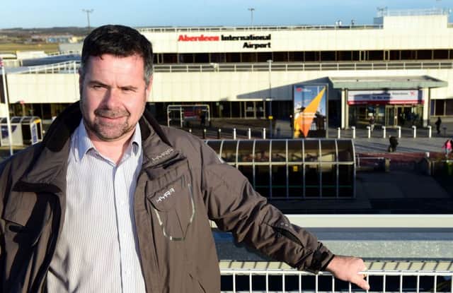 Roy Ferguson at Aberdeen Airport. Picture: Hemedia