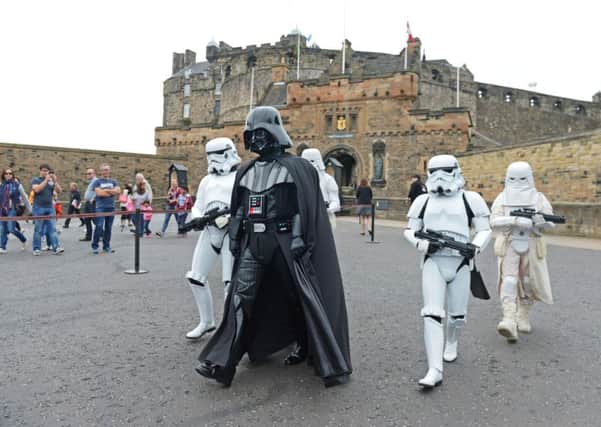 Darth Vader and a contingent of imperial storm troopers patrol Edinburgh Castle esplanade. Picture: Phil Wilkinson
