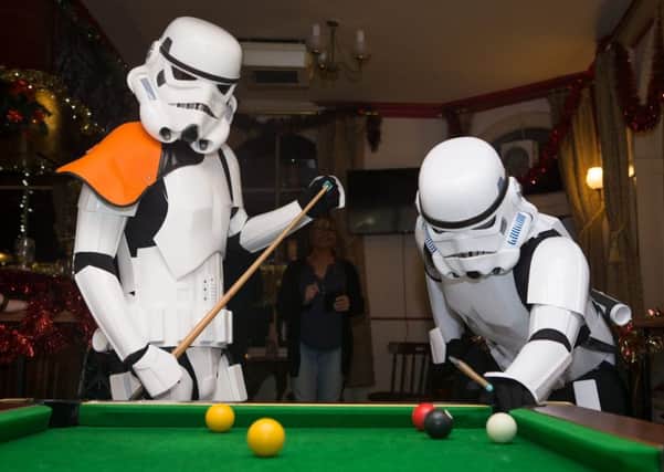 A pair of Stormtroopers go on a date in Folkestone Empire, Kent. Picture: SWNS