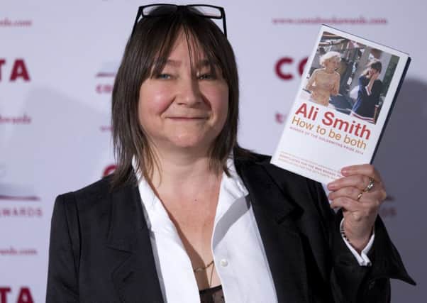 British author Ali Smith poses with her Novel Award-winning book How To Be Both. Picture: Getty Images