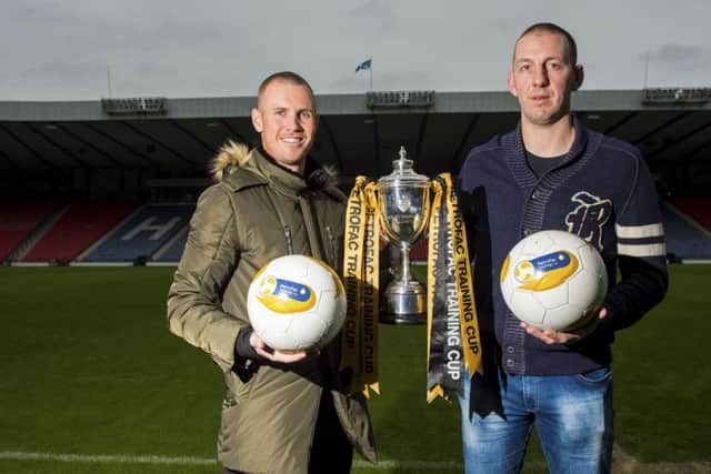 Kenny Miller was at Hampden yesterday with Peterhead keeper Graeme Smith to promote the Petrofac Training Cup final. Picture: SNS Group