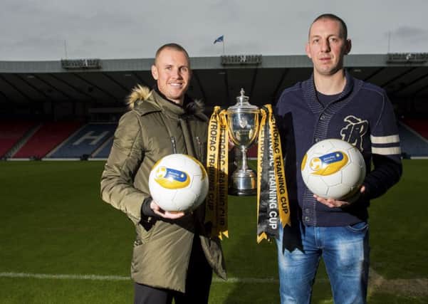 Kenny Miller was at Hampden yesterday with Peterhead keeper Graeme Smith to promote the Petrofac Training Cup final. Picture: SNS Group