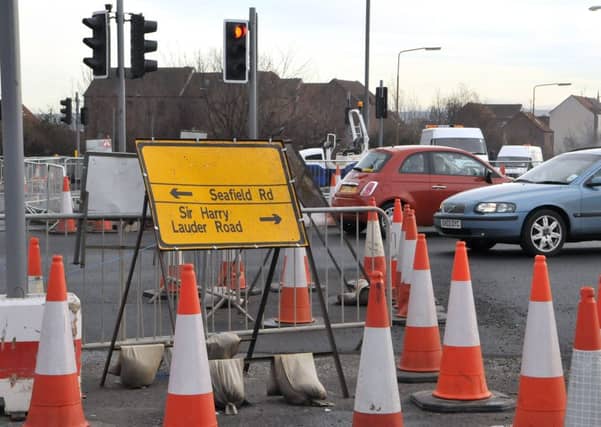 Sharing council services, roads for example, could help to avoid some or all of these cutbacks. Picture: Jon Savage