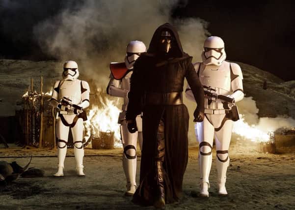 Kylo Ren (Adam Driver) with Stormtroopers. Picture: Lucasfilm/contributed