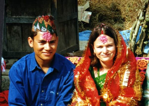 Charity founder Anna on her wedding day with Sanu