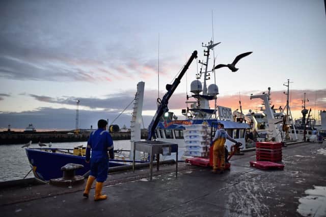 Fisherman land their catch at Peterhead, Aberdeenshire. Picture: by Jeff J Mitchell/Getty Images.
