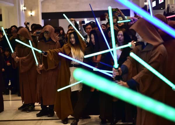 South Korean 'Jedis' gather to celebrate the release of Star Wars: The Force Awakens.