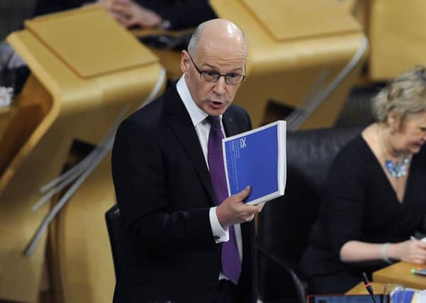 John Swinney has the power to raise the basic rate of income tax but he didnt use it in his budget. Picture: Neil Hanna