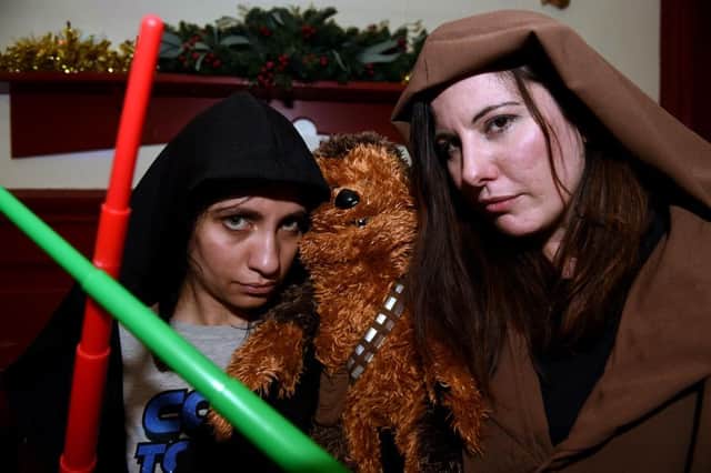 Cameo Cinema staff Ana Moraes  and Frieda Smith (right) get ready for the release of the new Star Wars Film. Picture: TSPL