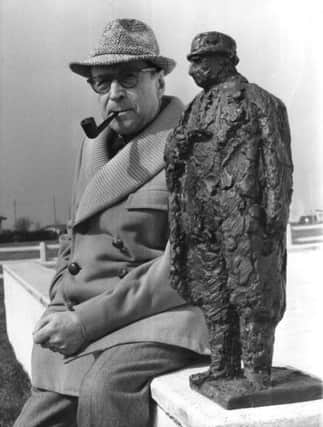 Georges Simenon, seen with a maquette of his creation Maigret. Picture: Getty Images