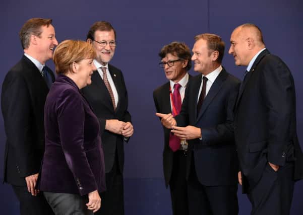 David Cameron with German Chancellor Angela Merkel and other EU leaders. Picture: AFP/Getty Images