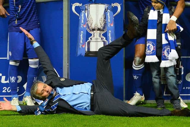 Chelsea win the 2014/15 League Cup and Mourinho celebrates in typically understated fashion. Picture: Getty