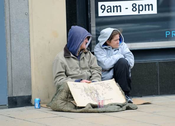 Young people out begging often have no permanent home. Picture: Lisa Ferguson