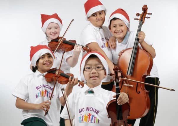 Children from Big Noise Govanhill in Glasgow feature on this year's People's Postcode Lottery Christmas card.  Picture: People's Postcode Lottery/PA Wire