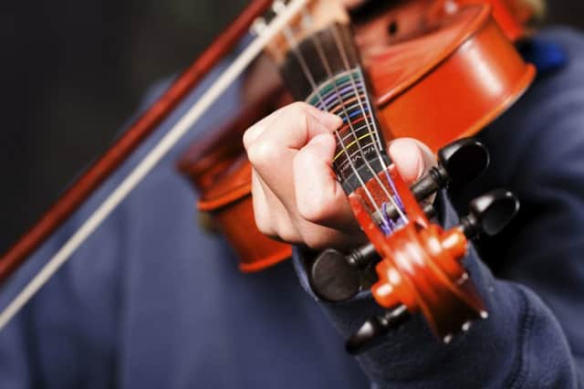 Free tuition for instruments such as the violin is under threat from Edinburgh city council cutbacks