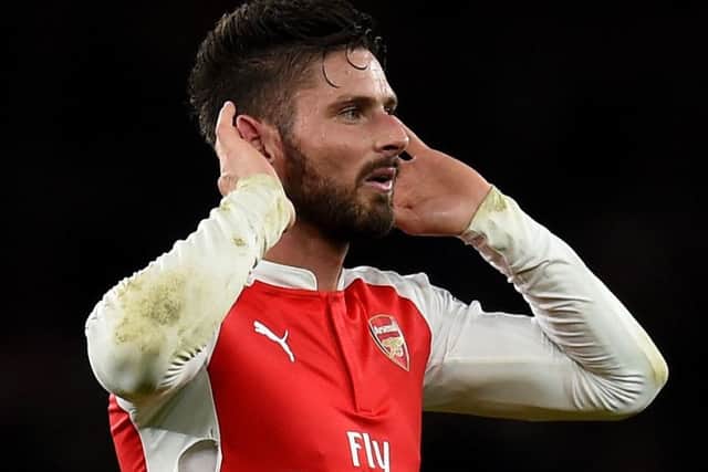 Olivier Giroud celebrates after the final whistle. Picture: Michael Regan/Getty