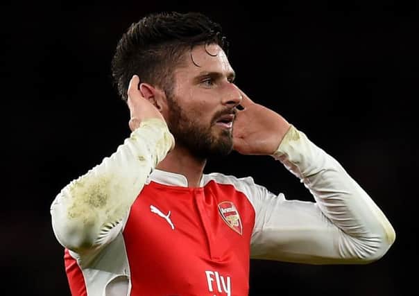 Olivier Giroud celebrates after the final whistle. Picture: Michael Regan/Getty