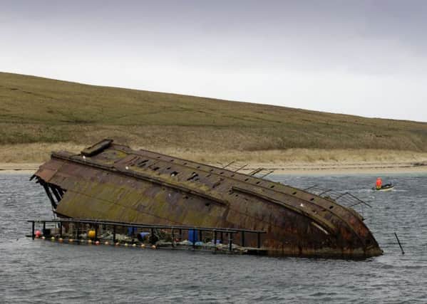 Remnants of vessels sunk in the Second World War formed the Churchill Barrier at Scapa Flow, Orkney. Picture: TSPL