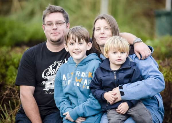 Nathan, with stepfather Jonathan, mum Donna and brother Ned, became ill in February and was diagnosed with a brain tumour  but his future looks bright. Picture: PA