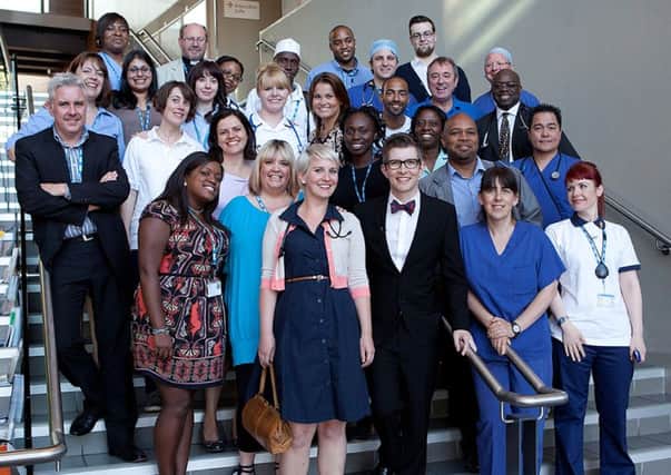 The Lewisham and Greenwich NHS Choir, pictured here with BBC choir master Gareth Malone, is hoping to claim the Christmas No1 slot with its charity single