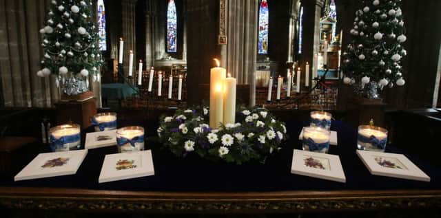 Candles which were lit during a special service to mark the anniversary of the Glasgow bin lorry crash . Picture: PA