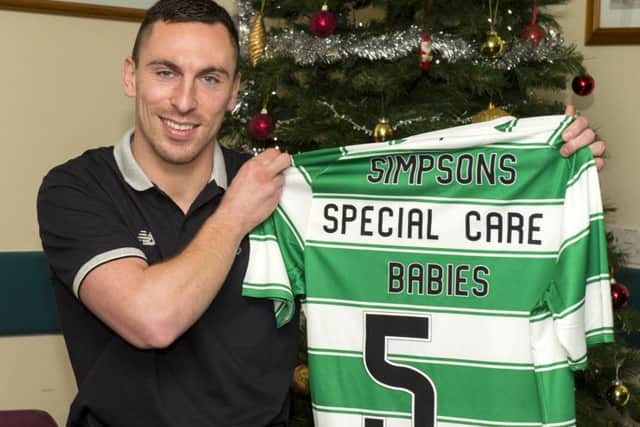 Celtic Captain Scott Brown presents a donation to Simpson's Special Care Babies at the Edinburgh Royal Infirmary. Picture: SNS