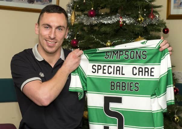 Celtic Captain Scott Brown presents a donation to Simpson's Special Care Babies at the Edinburgh Royal Infirmary. Picture: SNS