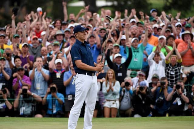 Jordan Spieth celebrates on the 18th green after winning the 2015 Masters at Augusta. Picture: Getty