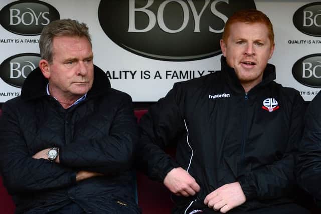 Bolton Wanderers manager Neil Lennon on the bench with his assistant Steve Walford (left). Picture: PA