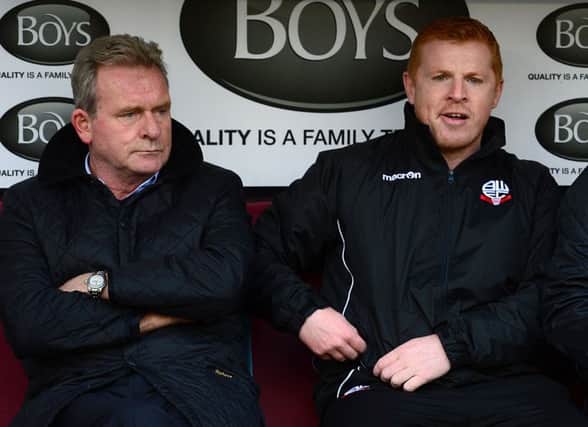Bolton Wanderers manager Neil Lennon on the bench with his assistant Steve Walford (left). Picture: PA