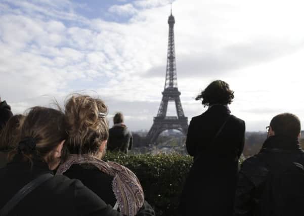Paris falls silent as the city  and the world  honours the dead of Vendredi Treize, when terrorists  murdered 130 in a series of shootings and suicide bombings. Picture: Getty
