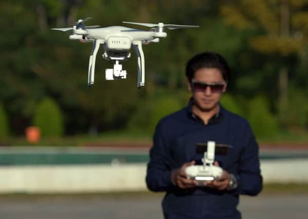 As well as being an expensive toy drones are being heralded as the answer to delivery problems as the popularity of internet shopping grows. Picture: Getty Images