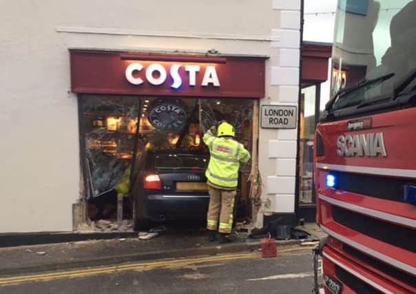A car embedded in the front of a Costa coffee store in Westerham, Kent. Picture: PA