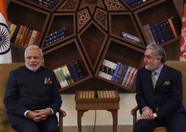 Indian prime minister Narendra Modi (left) met with Afghan chief executive Abdullah Abdullah during a stopover in the capital Kabul. Picture: Getty Images